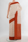 Pure Silk Cream Pochampally Saree with Pure Ikat on the body and Plain Border.  displayed on a mannequin
