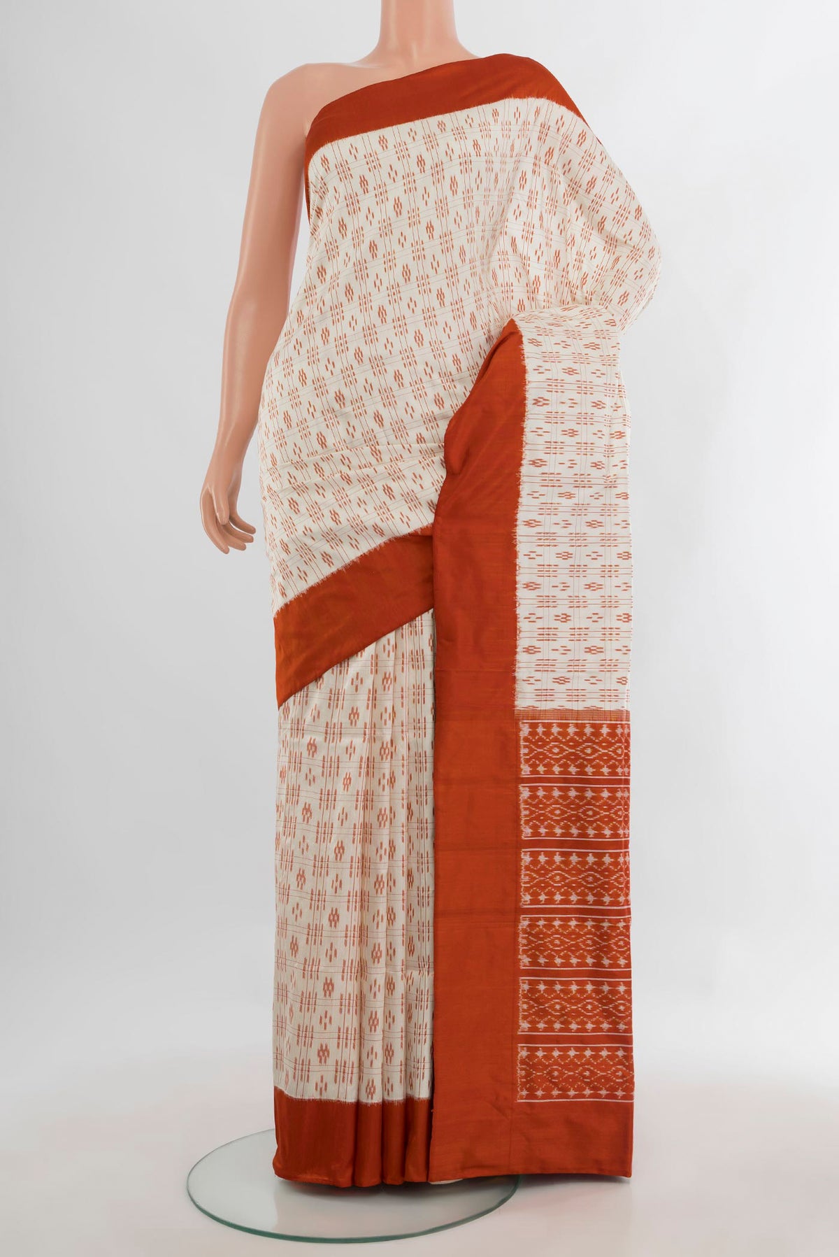 Pure Silk Cream Pochampally Saree with Pure Ikat on the body and Plain Border.  displayed on a mannequin
