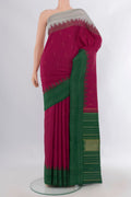 Pure Silk Maroon Kanchipuram Saree with Thread Butta on the body and Temple Border.  displayed on a mannequin