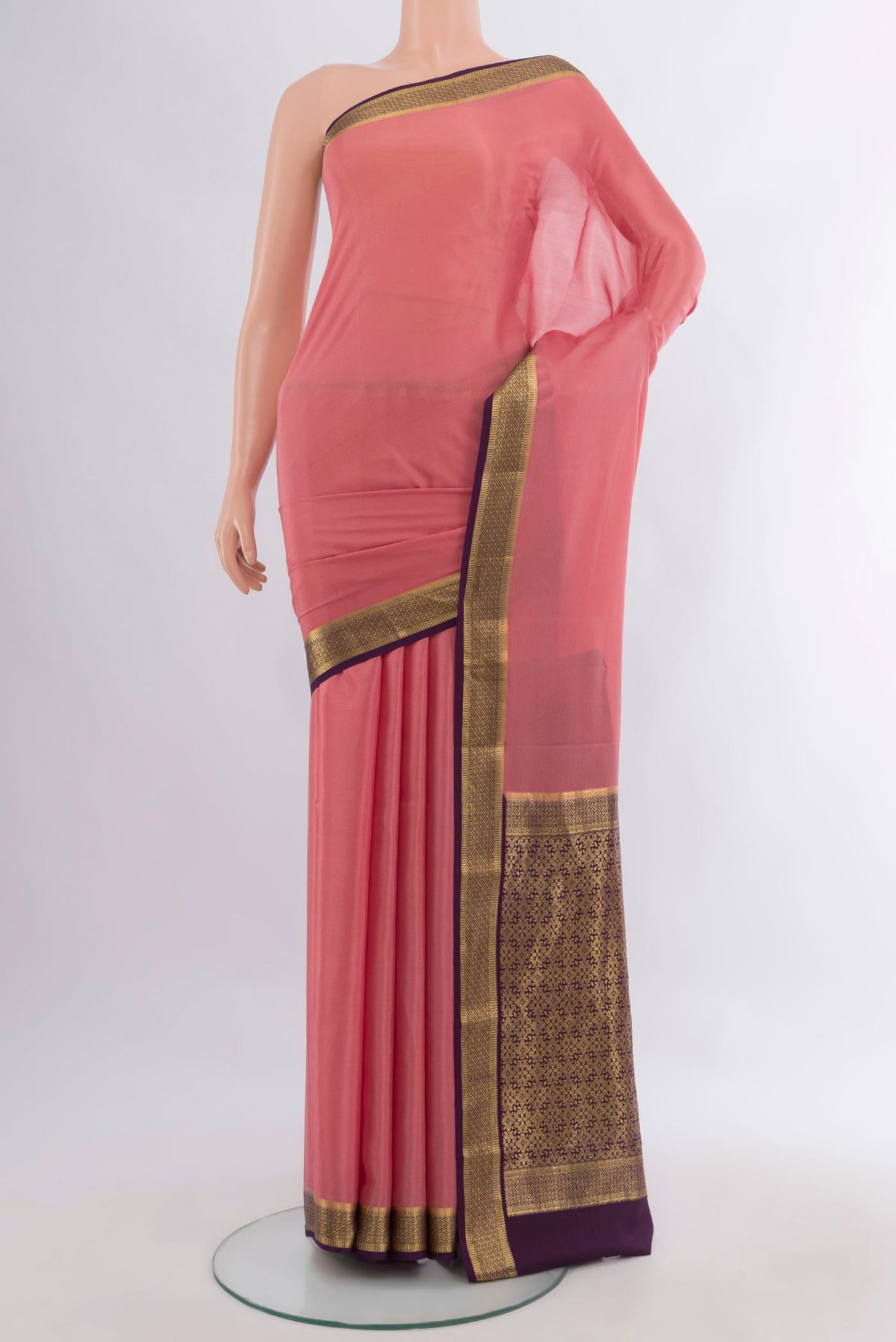 Pink Mysore Crepe Saree with Plain Body and Zari Border.  displayed on a mannequin