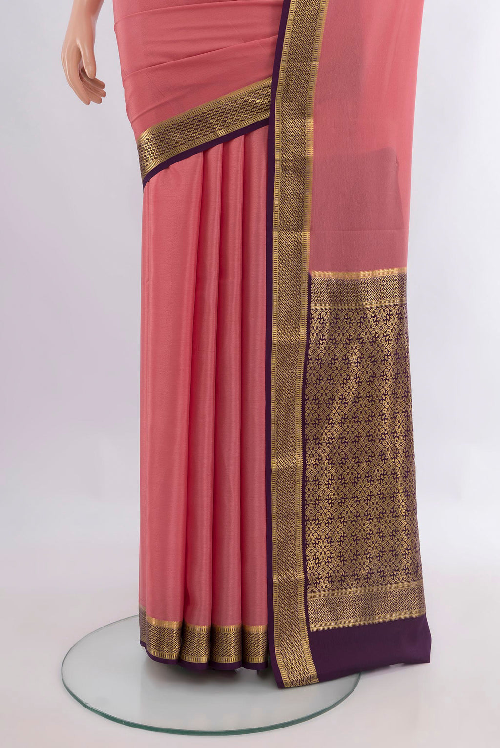 Pleats and pallu of Pink Mysore Crepe Saree with Plain Body and Zari Border. 