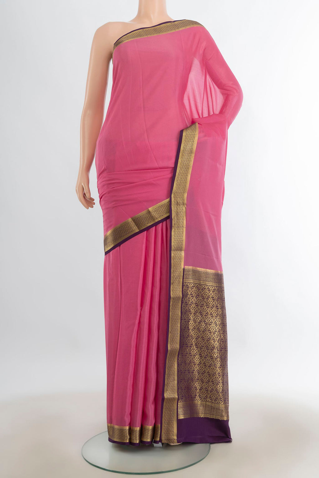 Bronze Mysore Crepe Saree with Plain Body and Silk Border.  displayed on a mannequin