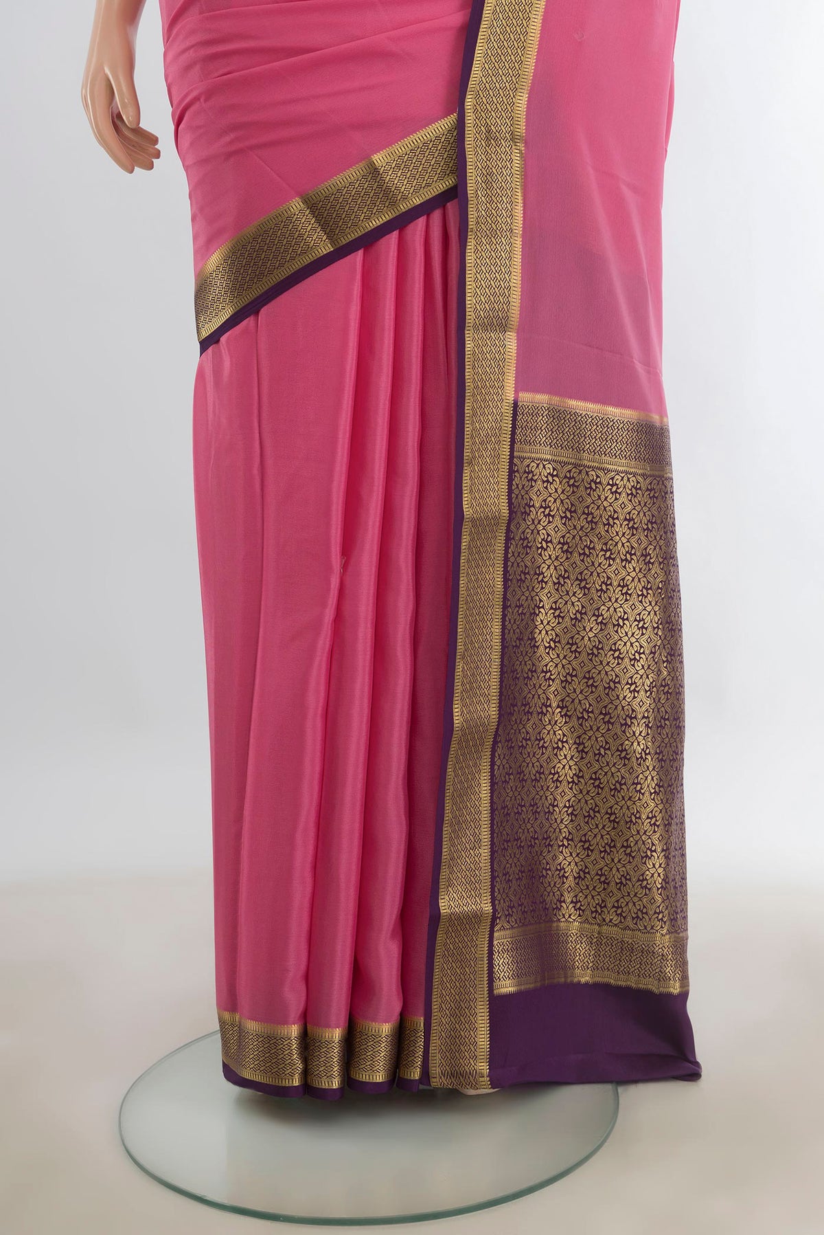 Pleats and pallu of Bronze Mysore Crepe Saree with Plain Body and Silk Border. 
