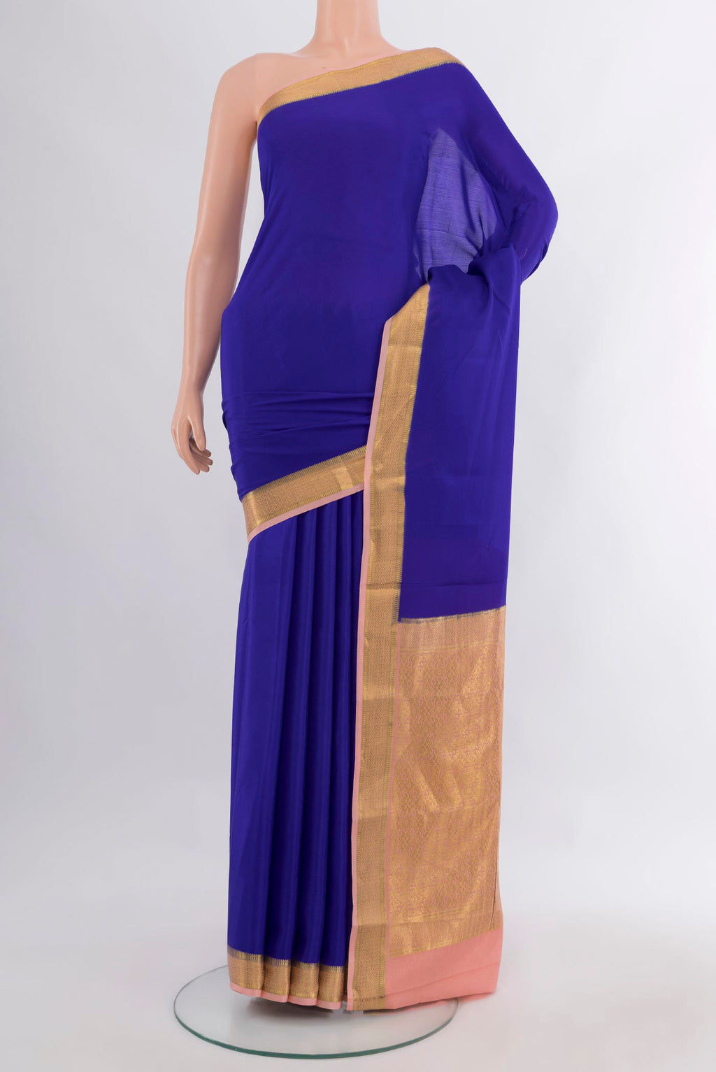 Royal Blue Mysore Crepe Saree with Plain Body and Zari Border.  displayed on a mannequin