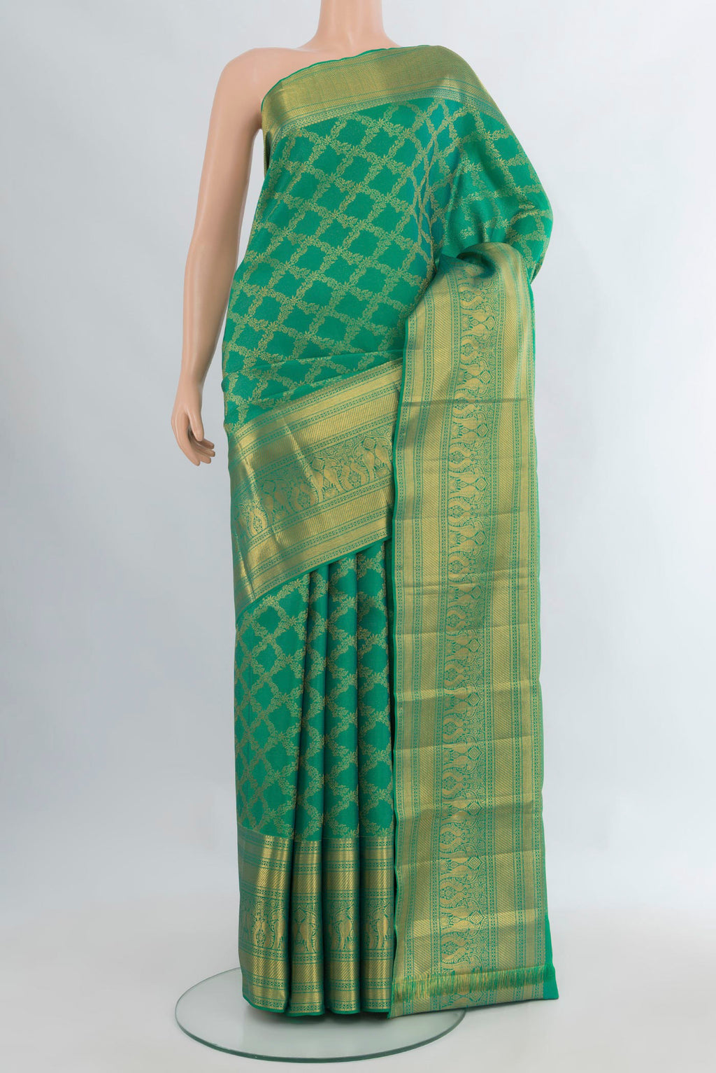 Pure Silk Turquoise Kanchipuram Saree with Zari Brocade on the body and Zari Border.  displayed on a mannequin