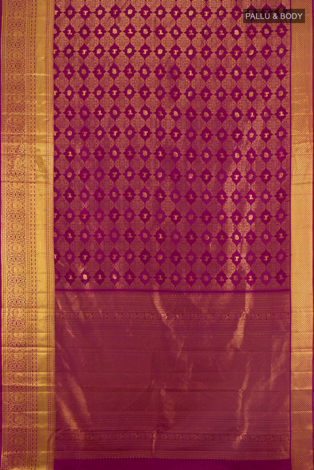 Flat view of Magenta Kanchipuram Silk Saree with Zari Brocade on the body and Zari Border. 