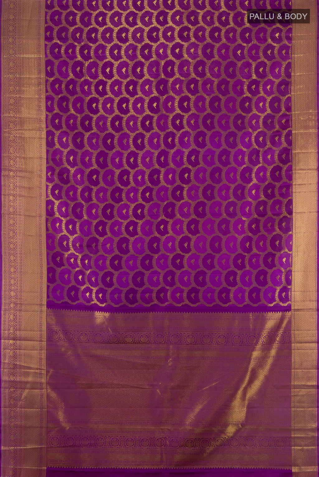 Flat view of Purple Kanchipuram Silk Saree with Zari Butta on the body and Zari Border. 