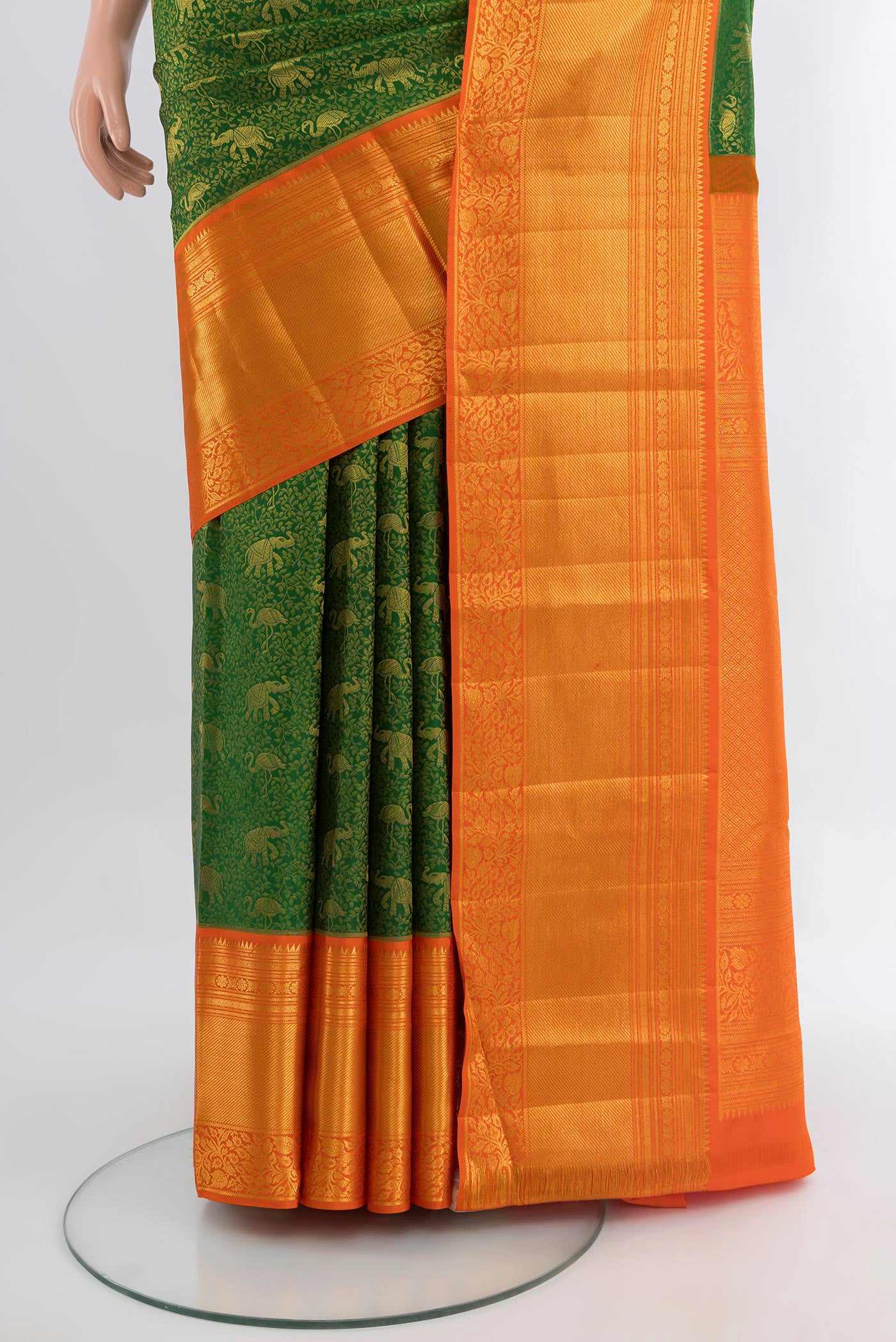 Pleats and pallu of Green Kanjivaram Silk Saree with Zari Brocade on the body and Zari Border. 