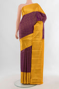 Pure Silk Magenta Kanjivaram Saree with Zari Brocade on the body and Zari Border.  displayed on a mannequin