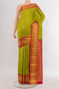 Pure Silk Green Kanjivaram Saree with Zari Brocade on the body and Zari Border.  displayed on a mannequin
