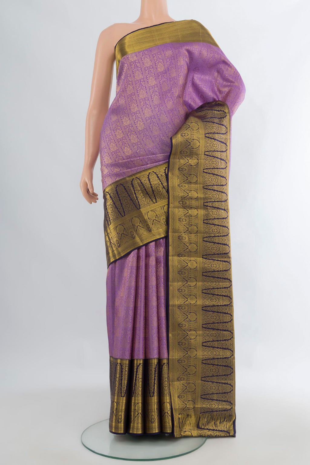 Pure Silk Lavender Kanjivaram Saree with Zari Brocade on the body and Zari Border.  displayed on a mannequin
