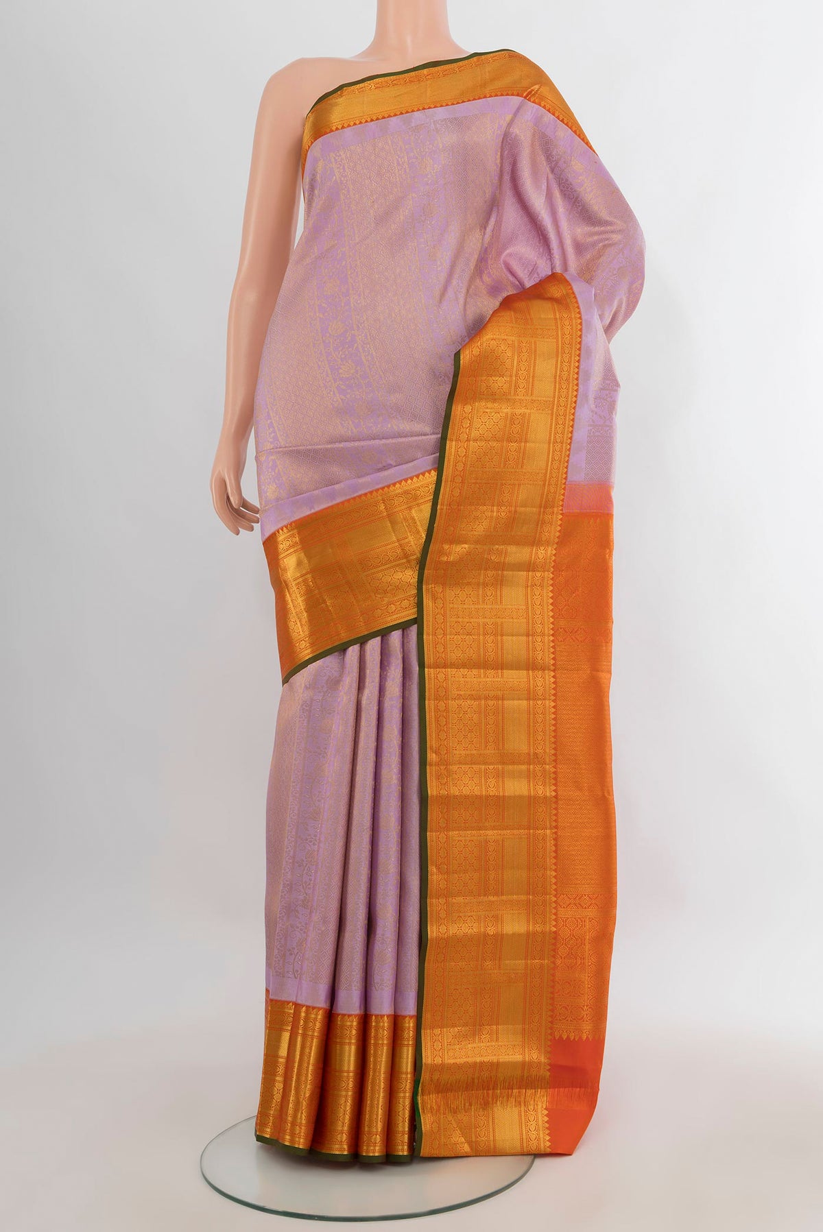 Pure Silk Lavender Kanjivaram Saree with Zari Brocade on the body and Zari Border.  displayed on a mannequin