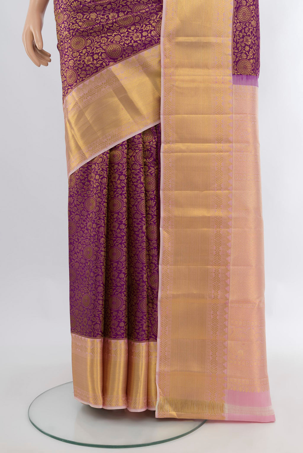 Pleats and pallu of Purple Kanjivaram Silk Saree with Zari Brocade on the body and Zari Border. 