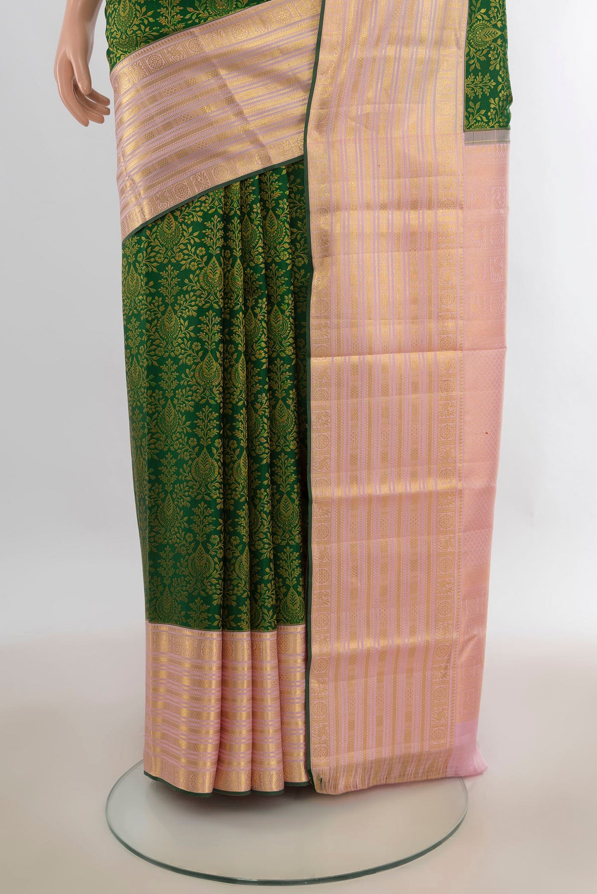 Pleats and pallu of Pure Silk Bottle Green Kanjivaram Saree with Zari Brocade on the body and Zari Border. 