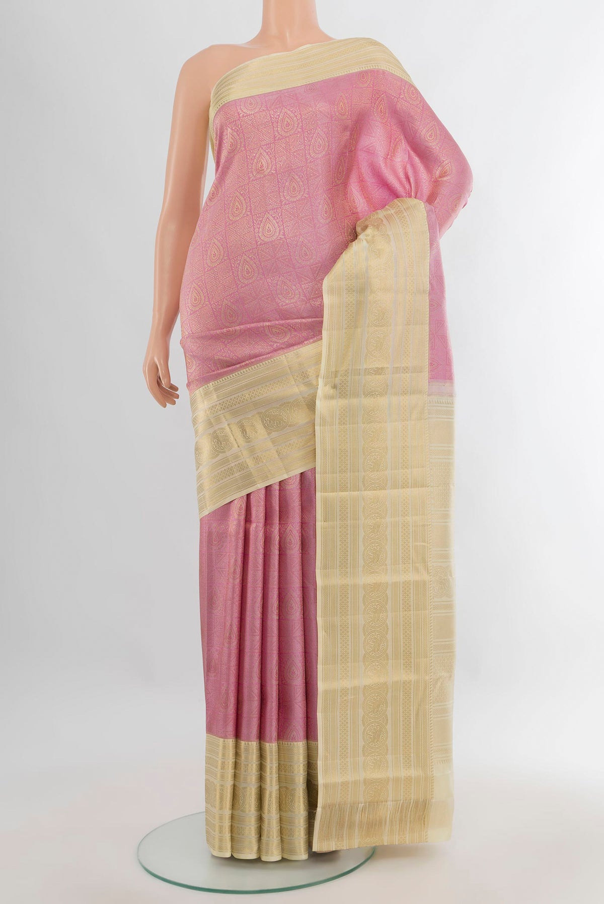 Pure Silk Rose pink Kanjivaram Saree with Zari Brocade on the body and Zari Border.  displayed on a mannequin