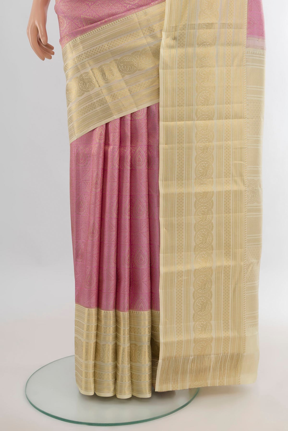 Pleats and pallu of Pure Silk Rose pink Kanjivaram Saree with Zari Brocade on the body and Zari Border. 