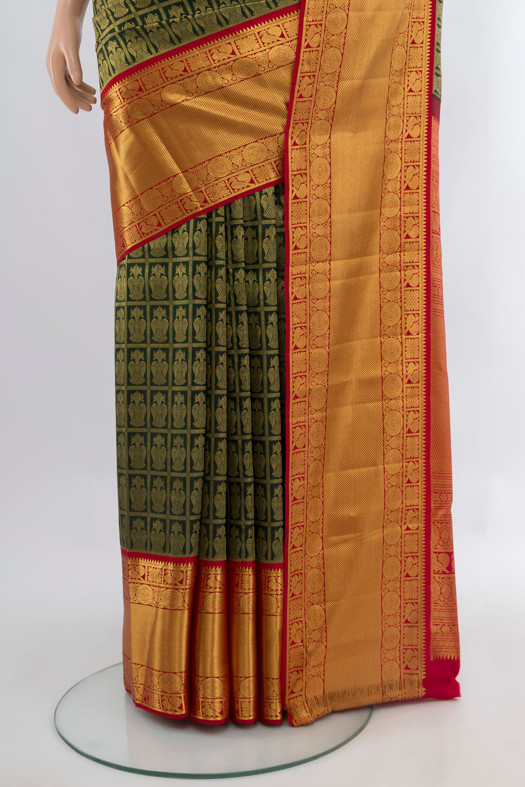 Pleats and pallu of Bottle Green Kanjivaram Silk Saree with Zari Brocade on the body and Zari Border. 