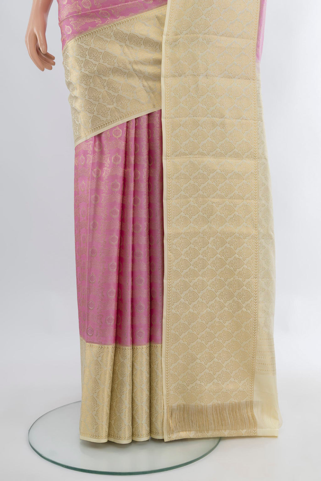 Pleats and pallu of Rose pink Kanjivaram Silk Saree with Zari Brocade on the body and Zari Border. 