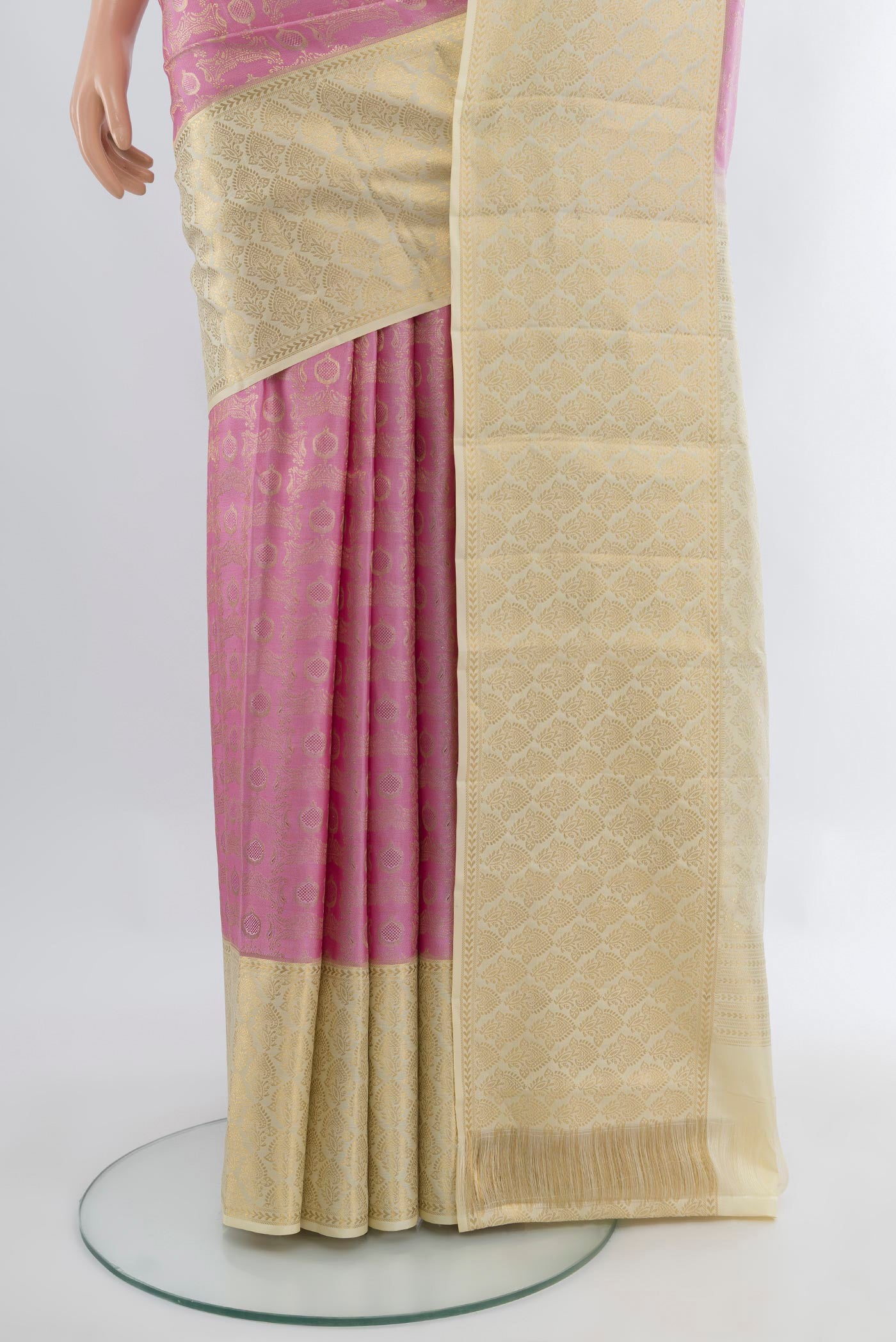 Pleats and pallu of Rose pink Kanjivaram Silk Saree with Zari Brocade on the body and Zari Border. 