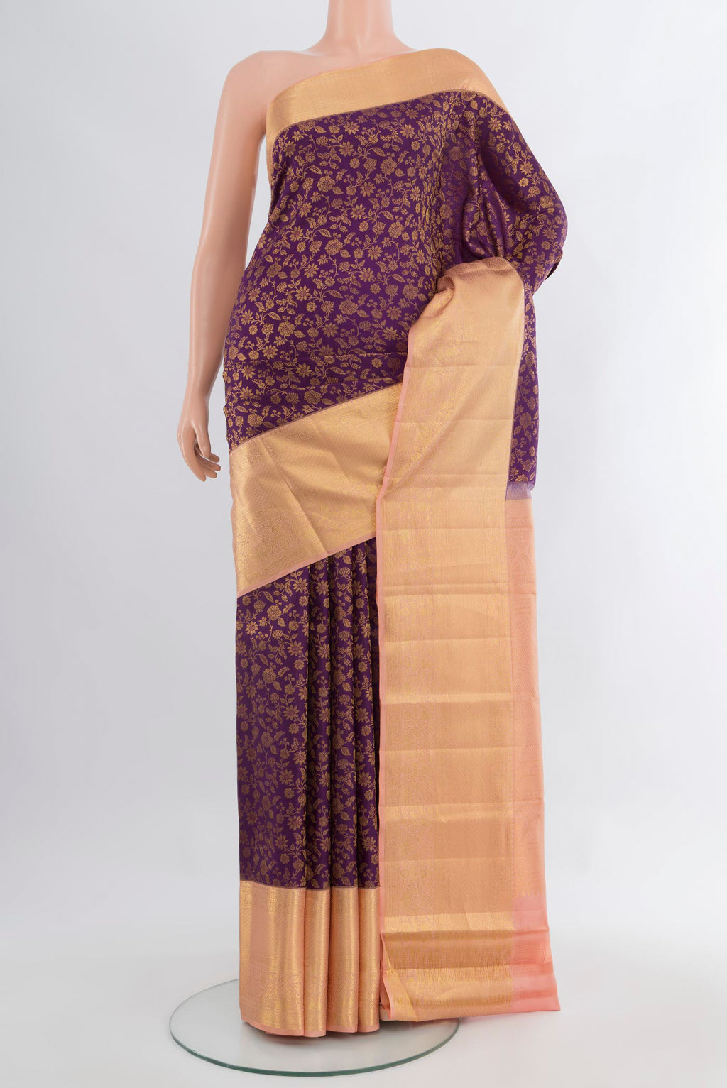 Violet Kanjivaram Silk Saree with Zari Brocade on the body and Zari Border.  displayed on a mannequin