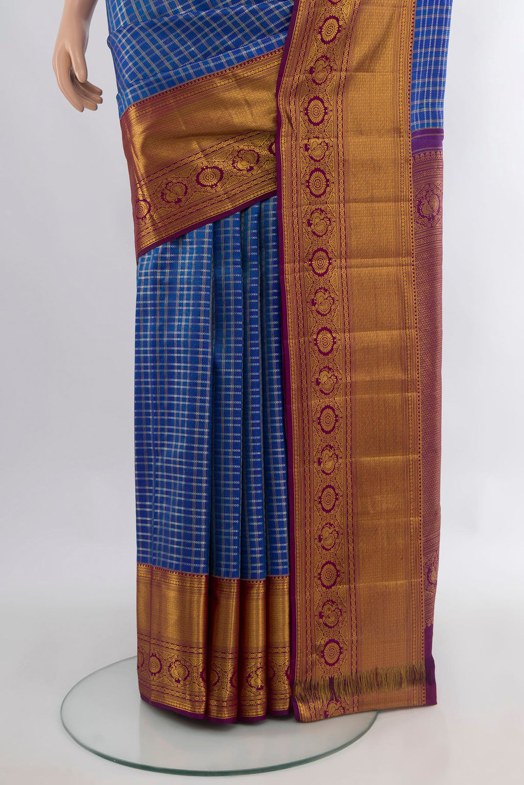 Pleats and pallu of Pure Silk Royal Blue Kanjivaram Saree with Checked design on the body and Zari Border. 