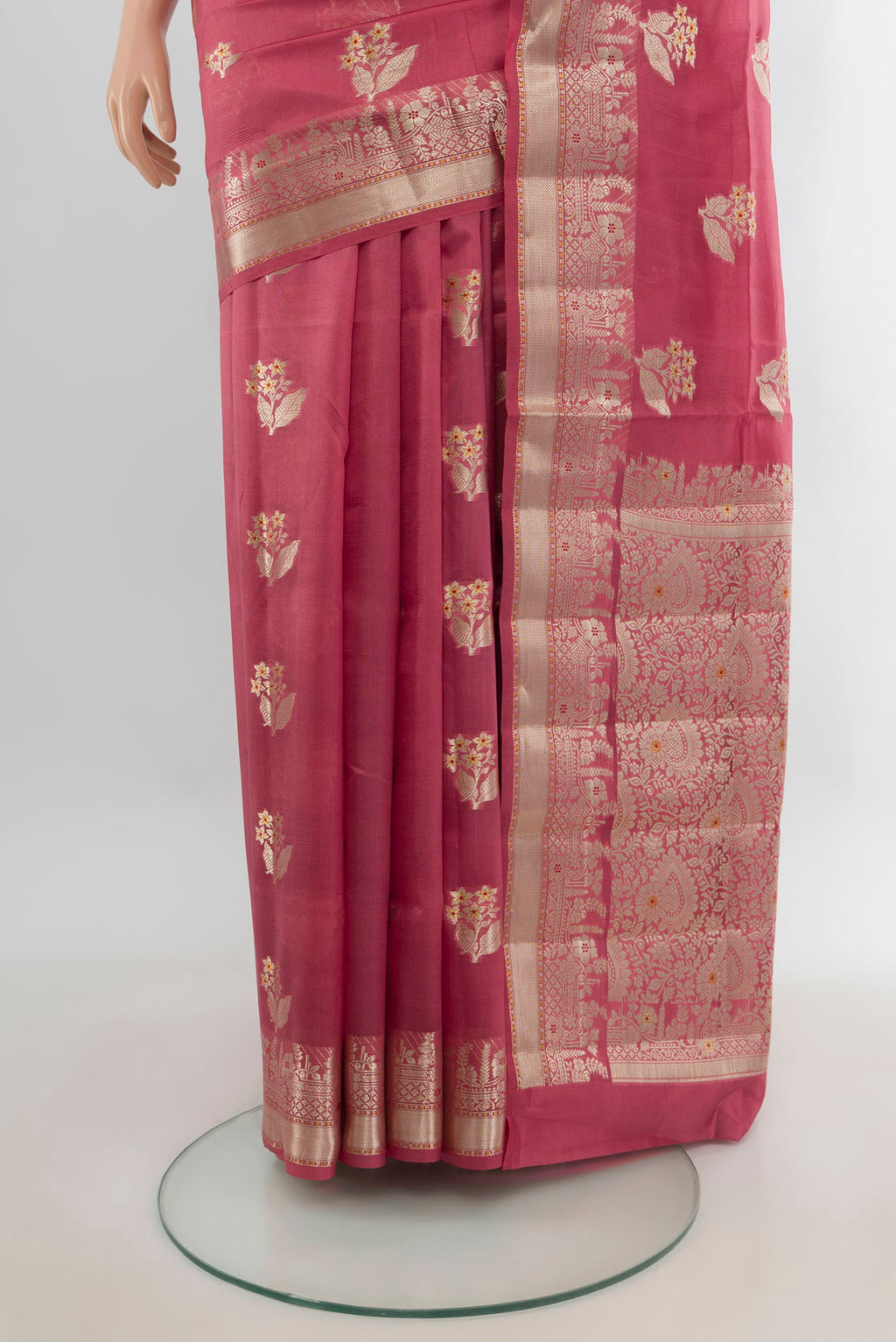 Pleats and pallu of Pure Silk Coral Banarasi Raw Saree with Zari Butta on the body and Zari Border. 