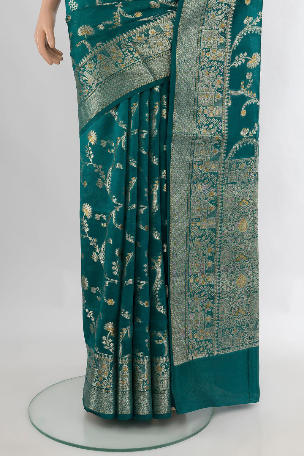 Pleats and pallu of Pure Silk Peacock Blue Banarasi Raw Saree with Zari Butta on the body and Zari Border. 