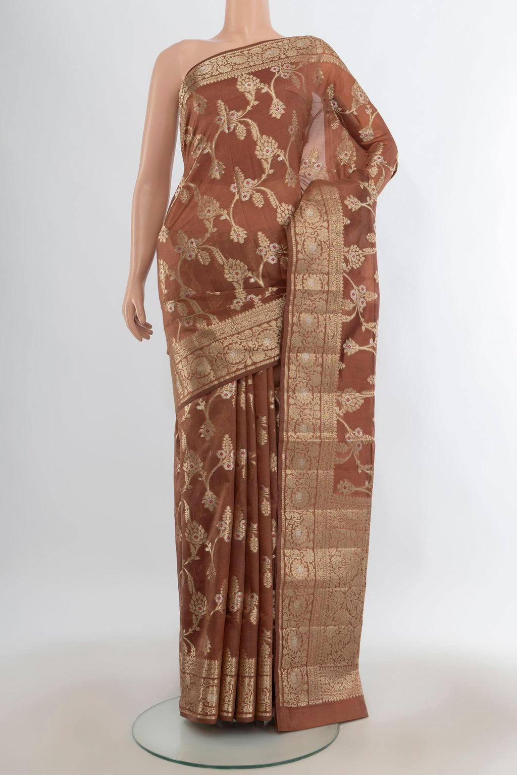Pure Silk Brown Banarasi Raw Saree with Zari Butta on the body and Zari Border.  displayed on a mannequin