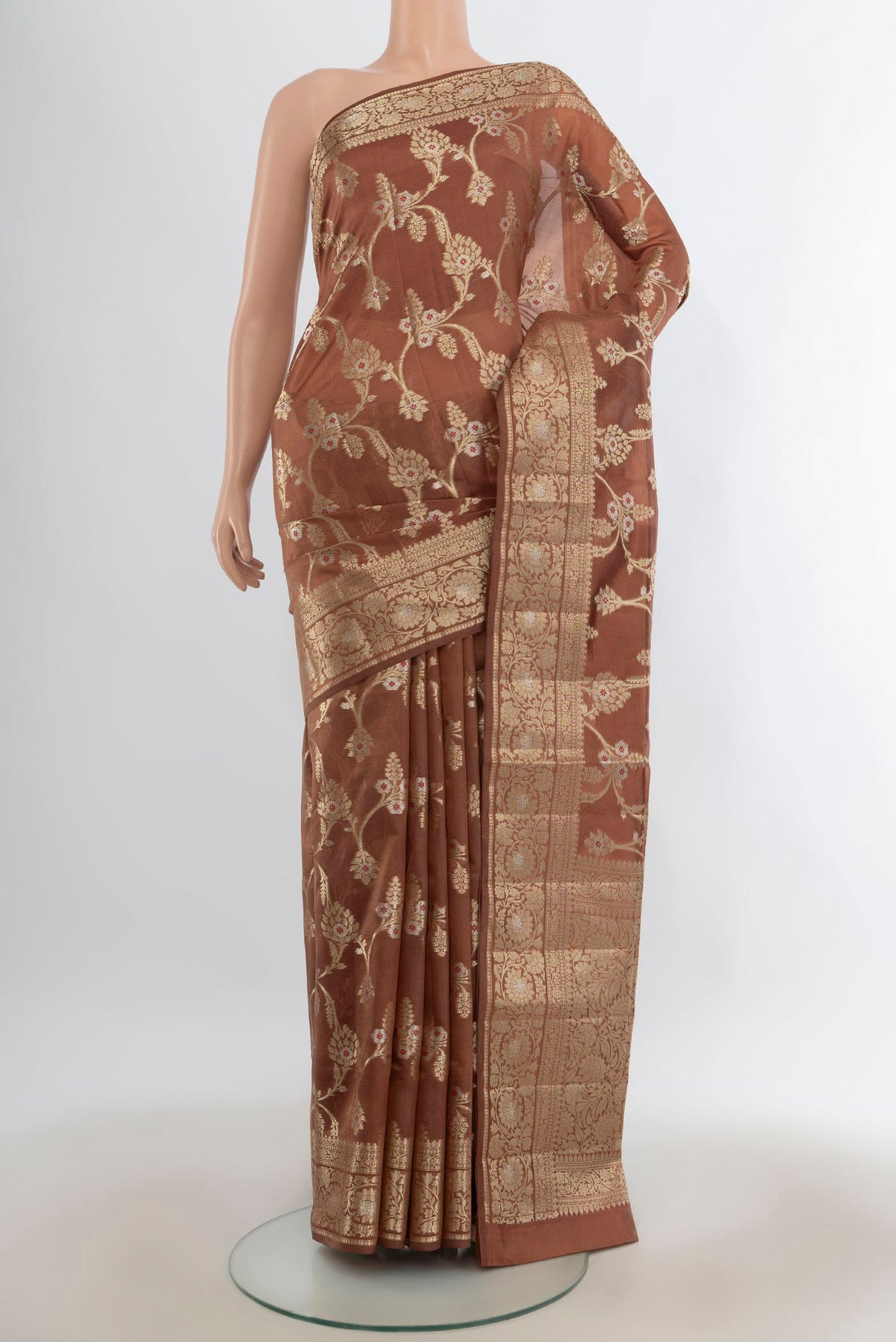 Pure Silk Brown Banarasi Raw Saree with Zari Butta on the body and Zari Border.  displayed on a mannequin
