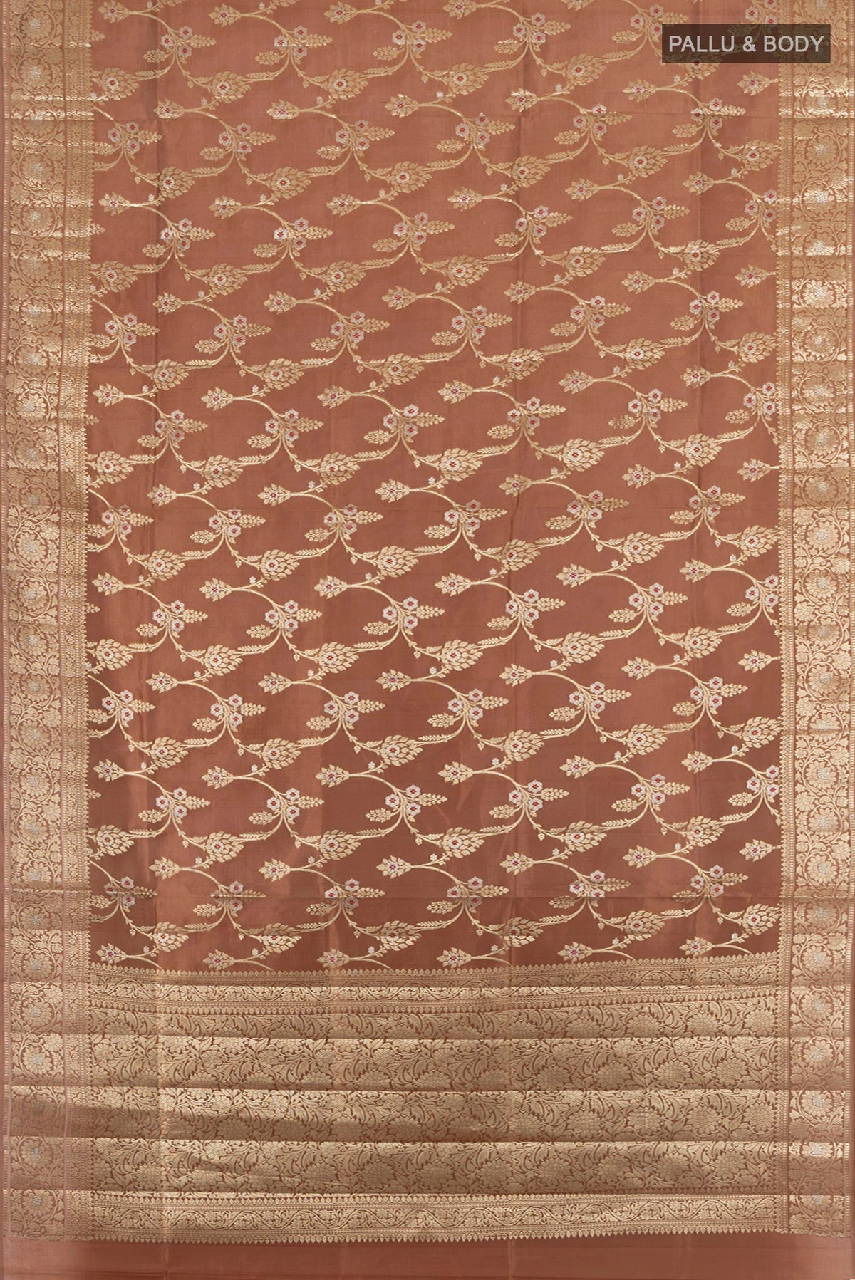 Flat view of Pure Silk Brown Banarasi Raw Saree with Zari Butta on the body and Zari Border. 