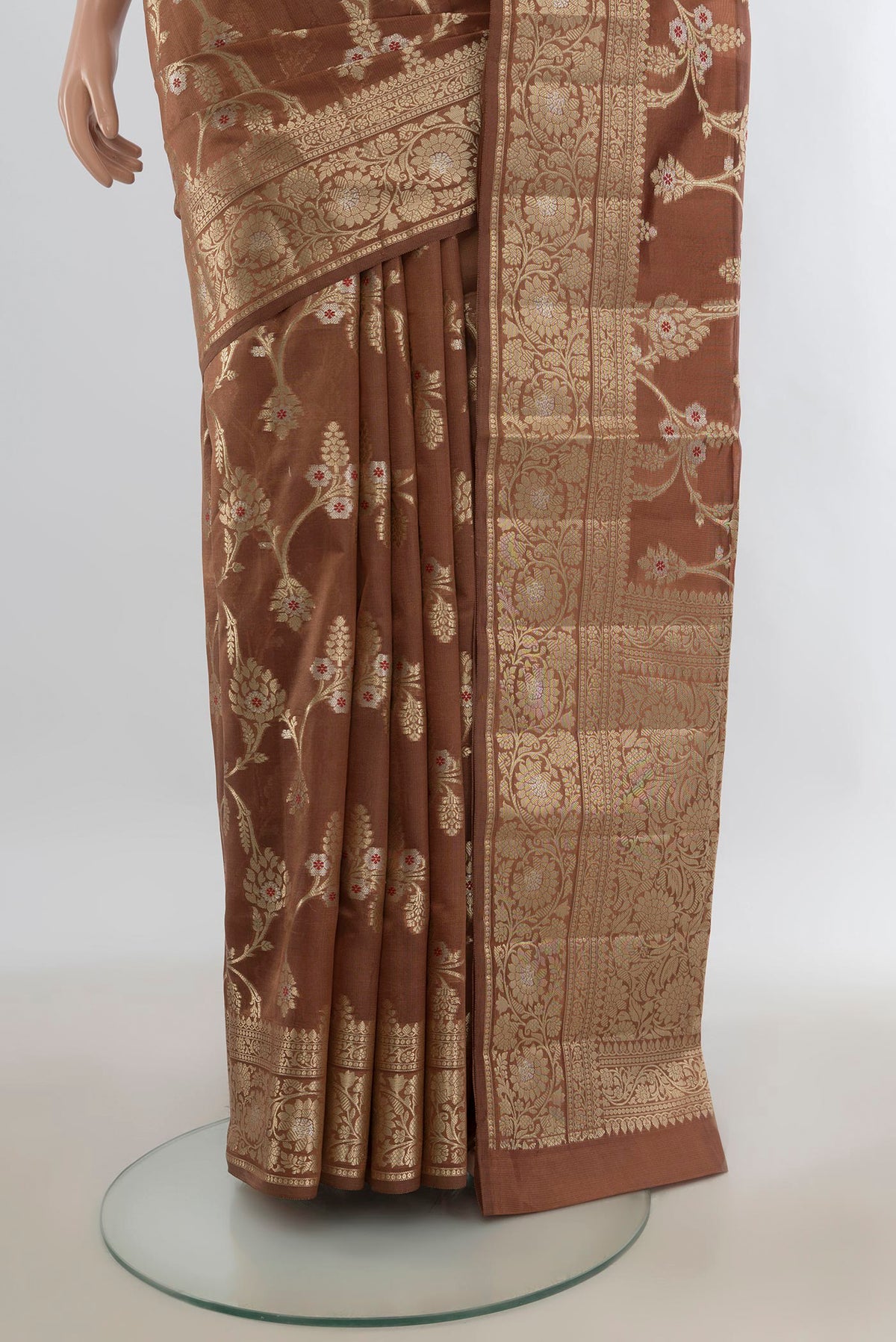 Pleats and pallu of Pure Silk Brown Banarasi Raw Saree with Zari Butta on the body and Zari Border. 