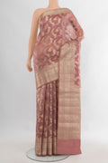 Pure Silk Rose Gold Banarasi Raw Saree with Zari Butta on the body and Zari Border.  displayed on a mannequin