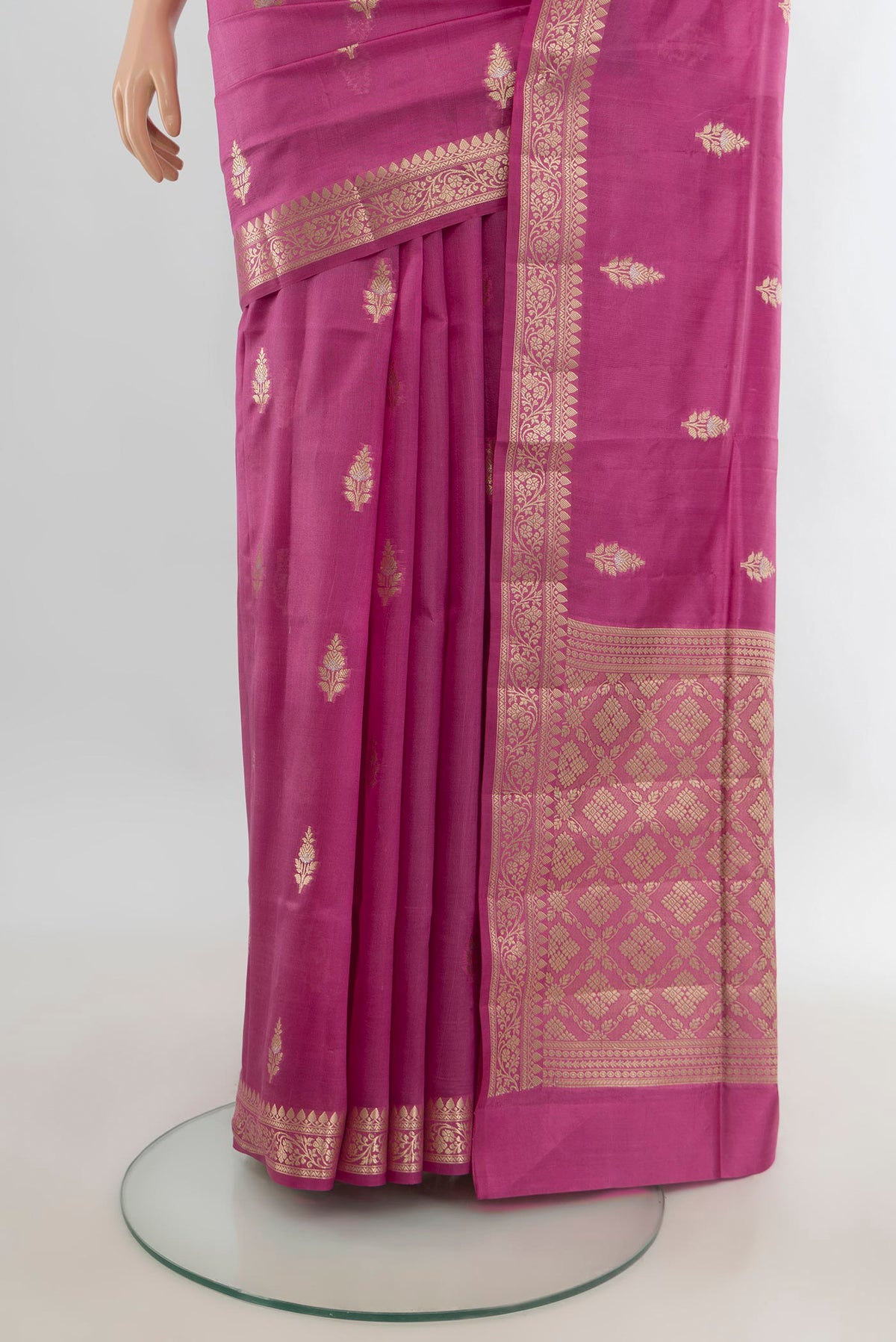 Pleats and pallu of Pure Silk Pink Banarasi Raw Saree with Zari Butta on the body and Zari Border. 