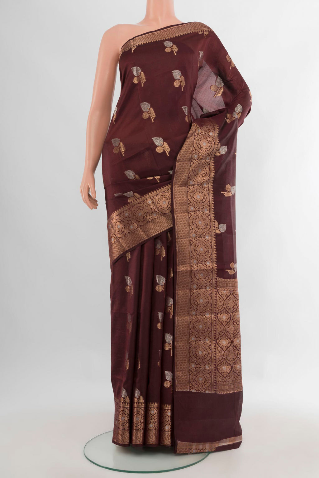 Pure Silk Coffee Brown Banarasi Raw Saree with Zari Butta on the body and Zari Border.  displayed on a mannequin