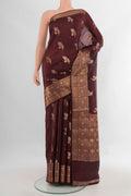 Pure Silk Coffee Brown Banarasi Raw Saree with Zari Butta on the body and Zari Border.  displayed on a mannequin