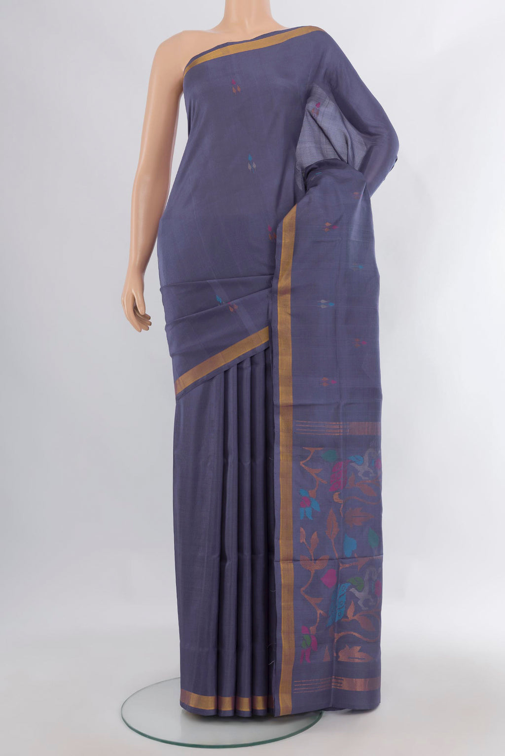 Pure Silk Grey Uppada Saree with Zari And Thread Butta on the body and Zari Border.  displayed on a mannequin