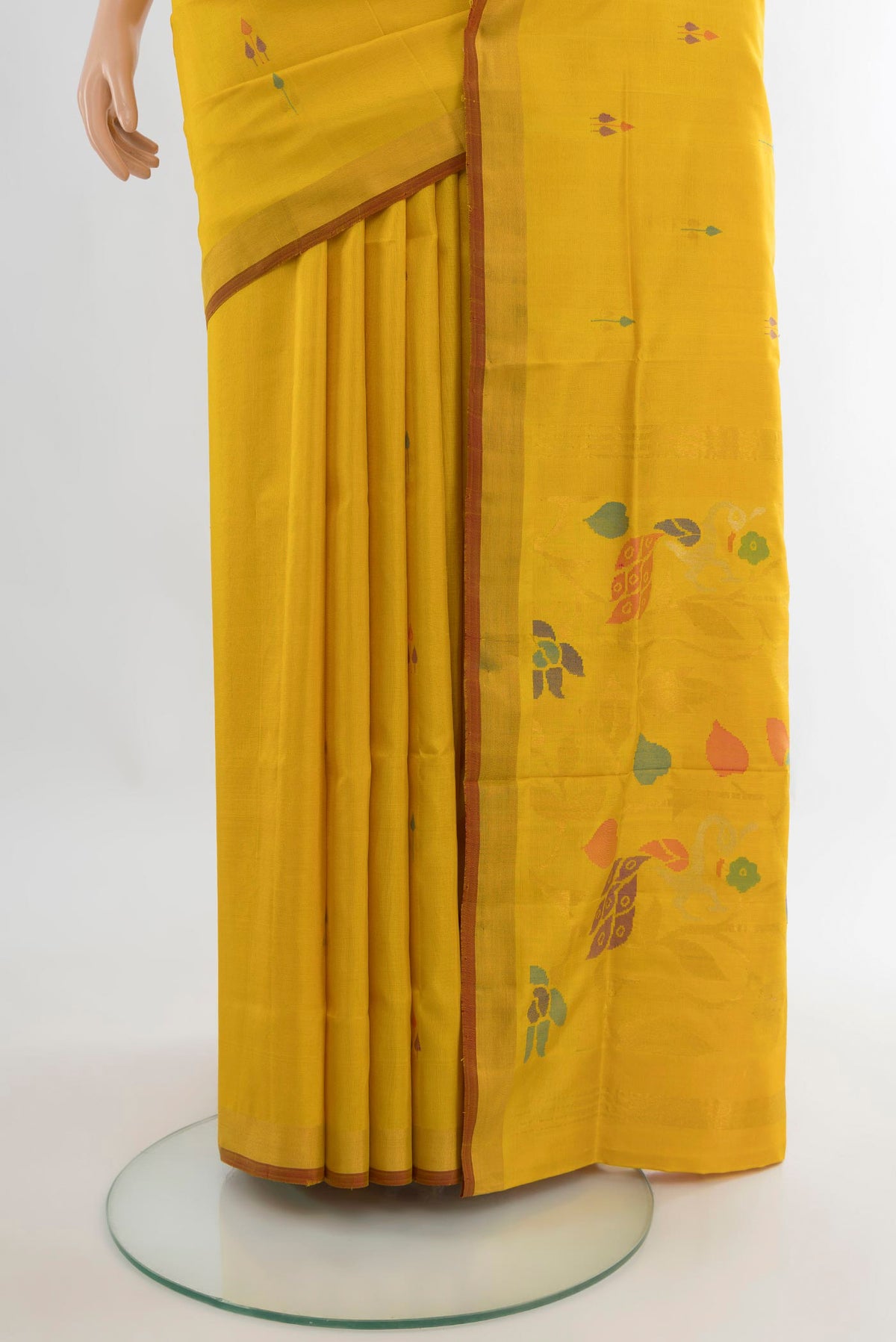 Pleats and pallu of Pure Silk Yellow Uppada Saree with Zari And Thread Butta on the body and Zari Border. 