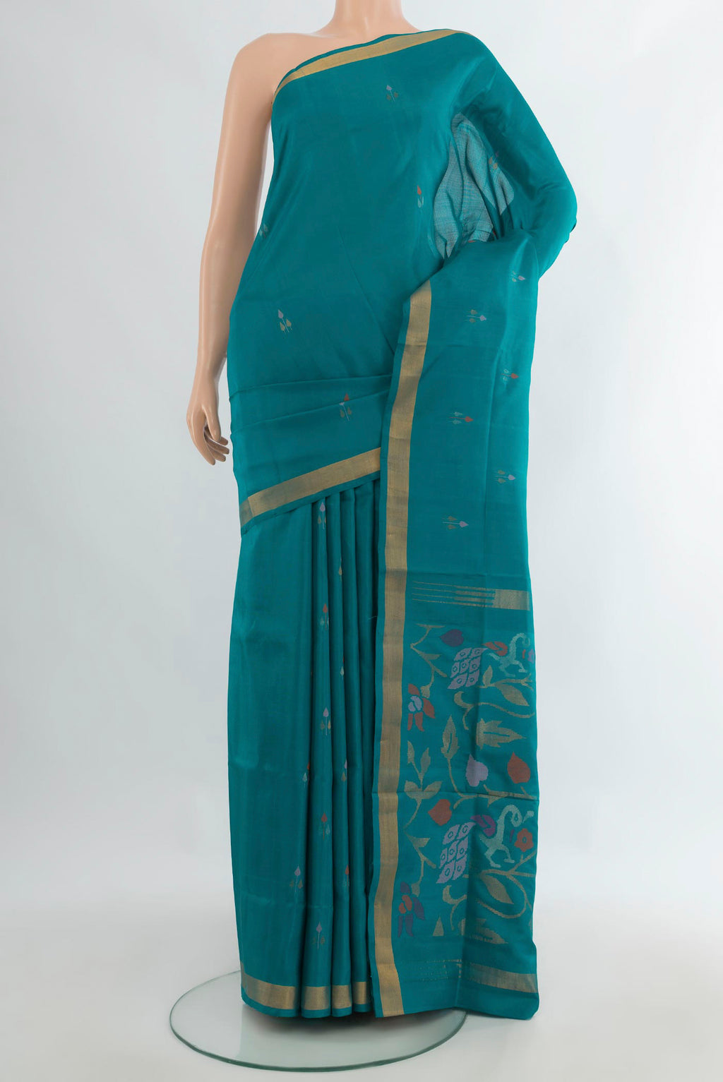 Pure Silk Peacock Blue Uppada Saree with Zari Butta on the body and Zari Border.  displayed on a mannequin