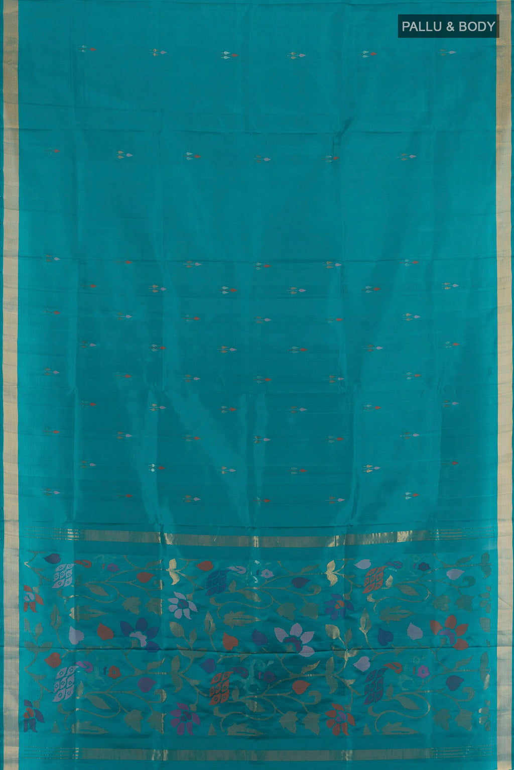 Flat view of Pure Silk Peacock Blue Uppada Saree with Zari Butta on the body and Zari Border. 