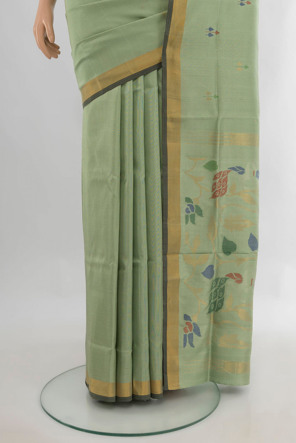 Pleats and pallu of Pure Silk Light Green Uppada Saree with Zari And Thread Butta on the body and Zari Border. 