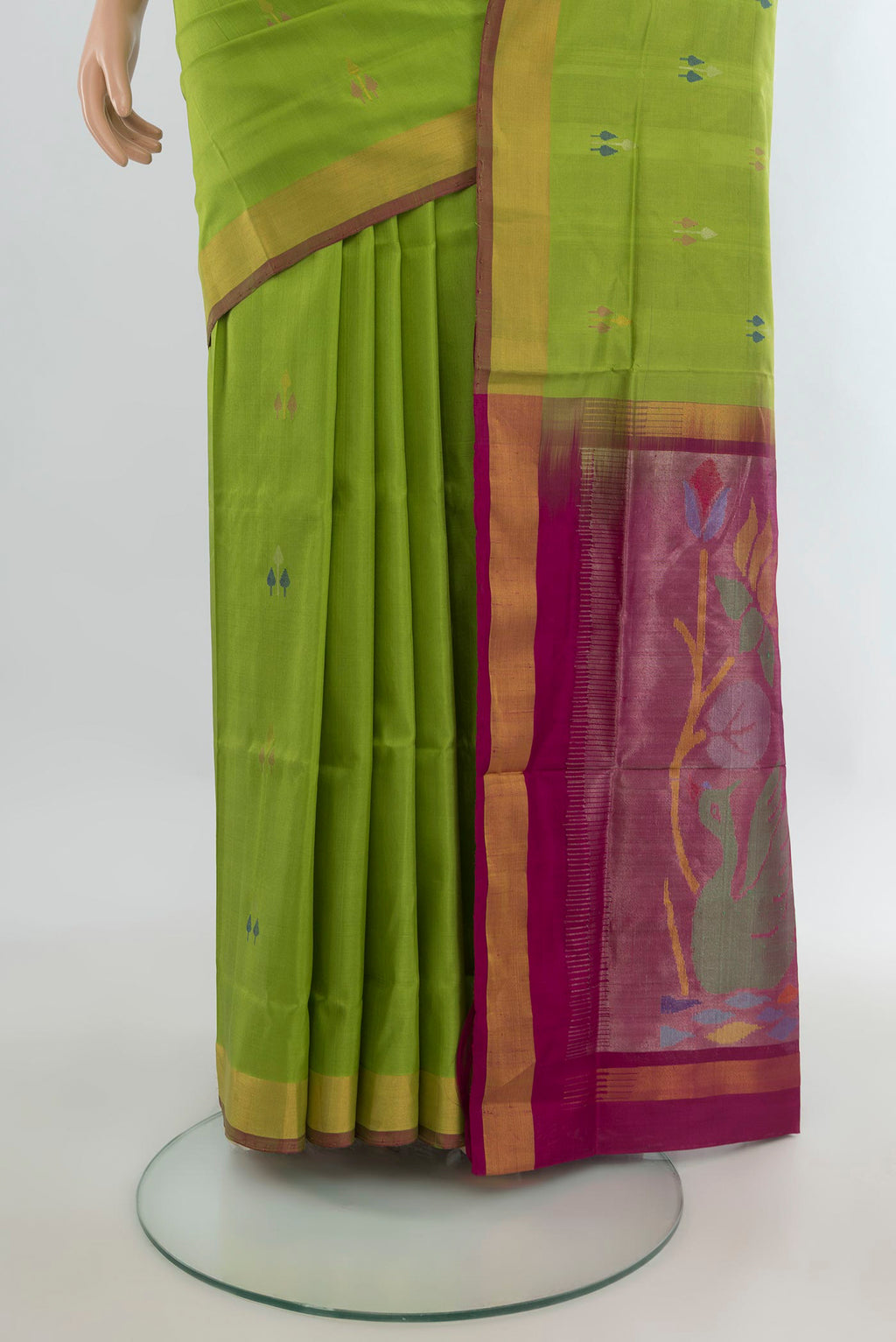 Pleats and pallu of Pure Silk Light Green Uppada Saree with Zari And Thread Butta on the body and Zari Border. 