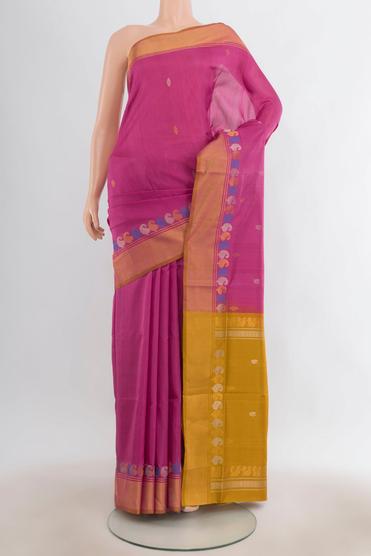 Pure Silk Bronze Uppada Saree with Zari Butta on the body and Silk Border.  displayed on a mannequin