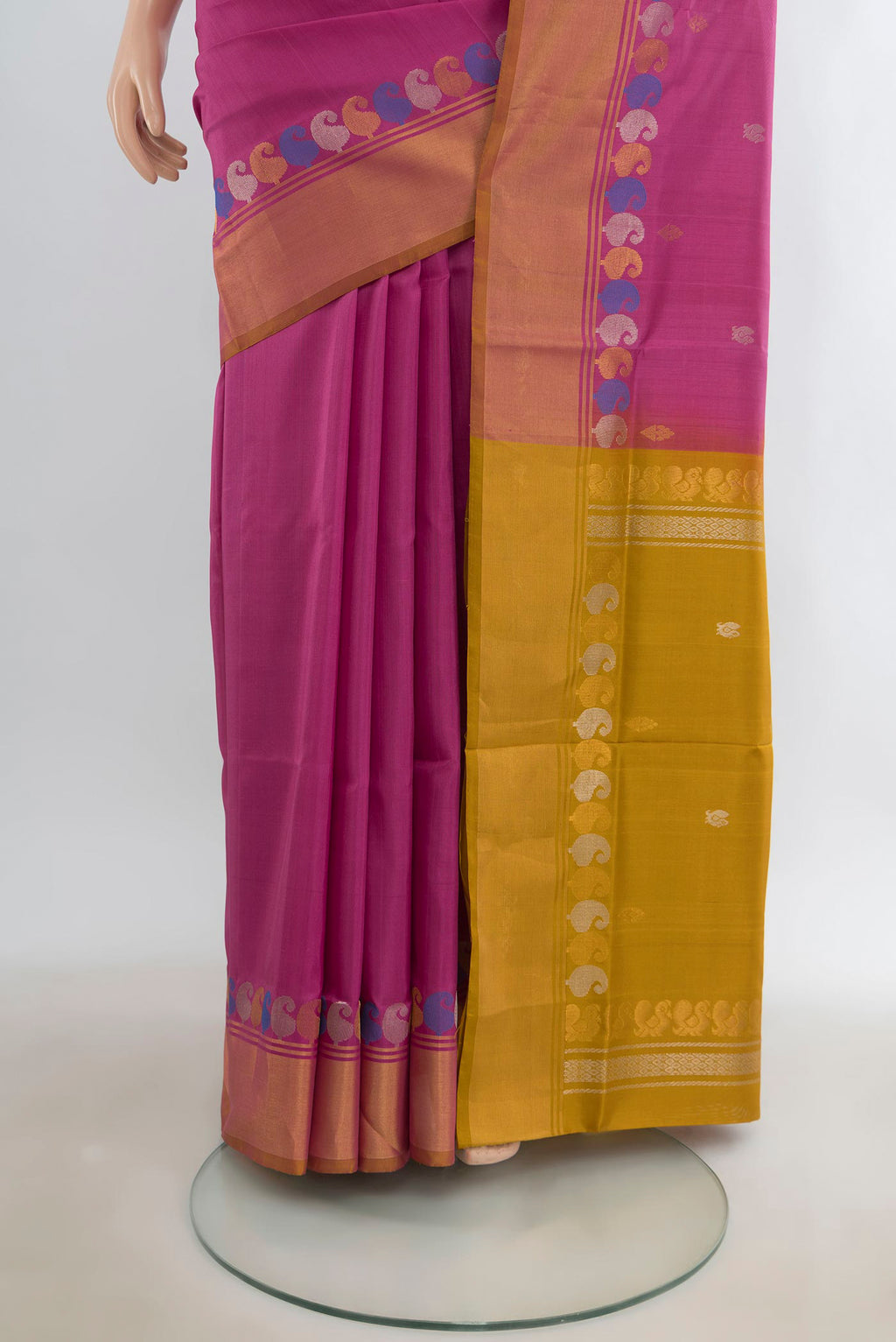 Pleats and pallu of Pure Silk Bronze Uppada Saree with Zari Butta on the body and Silk Border. 