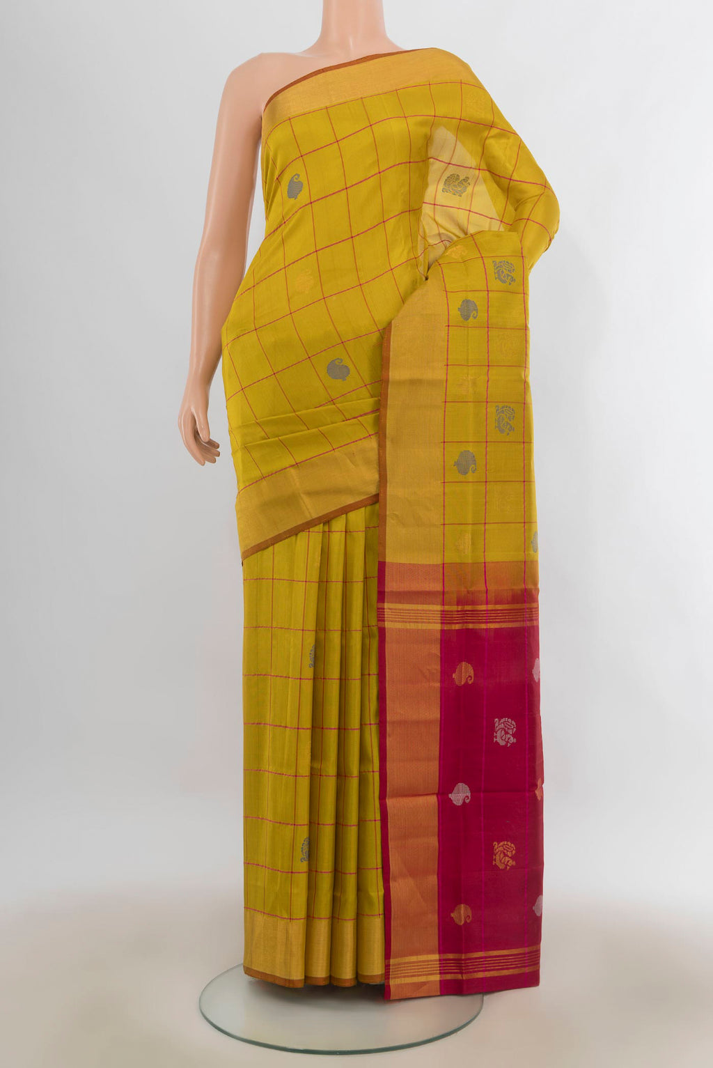 Pure Silk Mustard Uppada Saree with Checked design on the body and Zari Border.  displayed on a mannequin