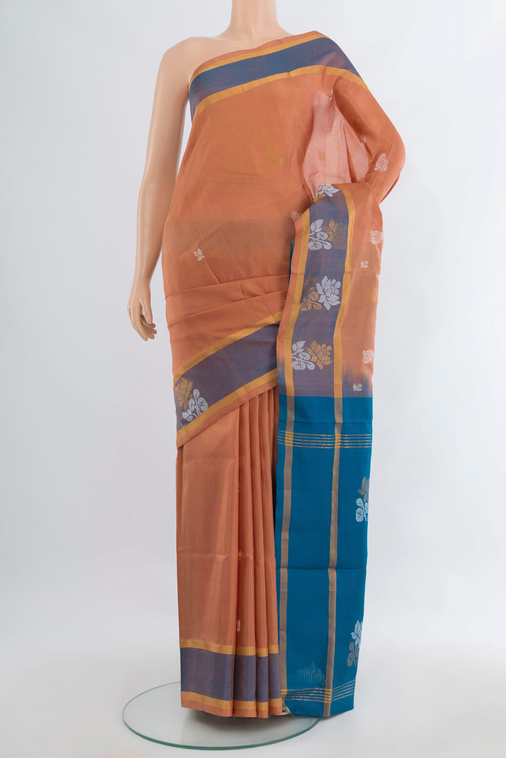 Pure Silk Peach Uppada Saree with Zari Butta on the body and Zari Border.  displayed on a mannequin