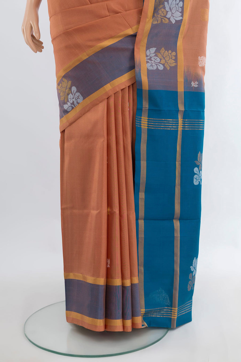 Pleats and pallu of Pure Silk Peach Uppada Saree with Zari Butta on the body and Zari Border. 