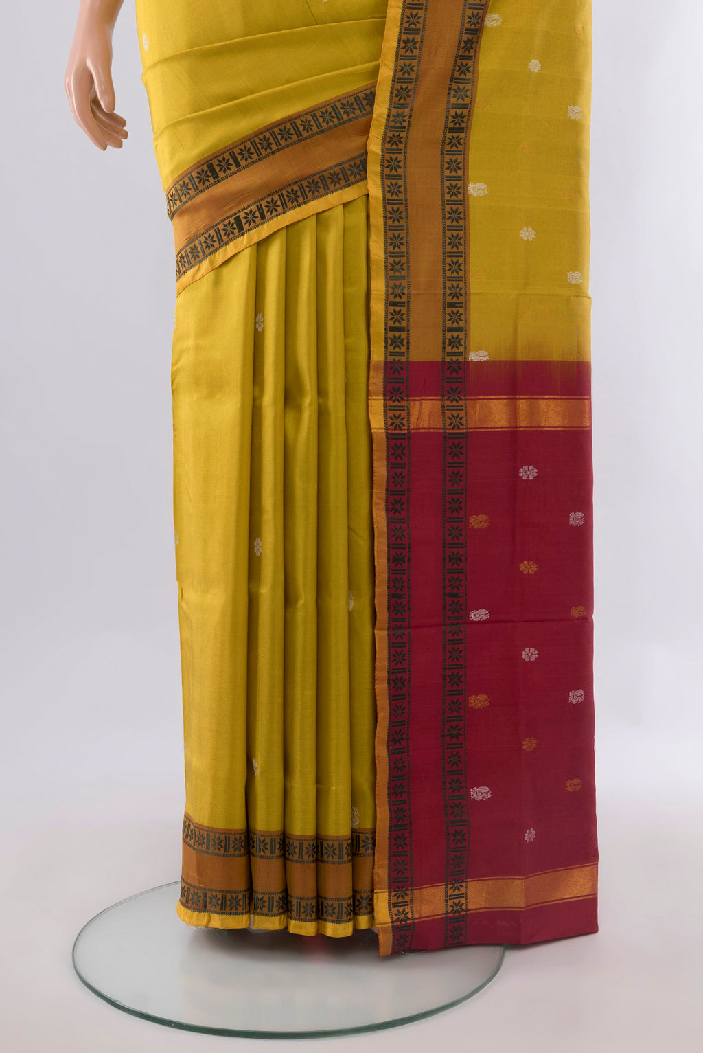 Pleats and pallu of Pure Silk Yellow Uppada Saree with Thread Butta on the body and Thread Border. 