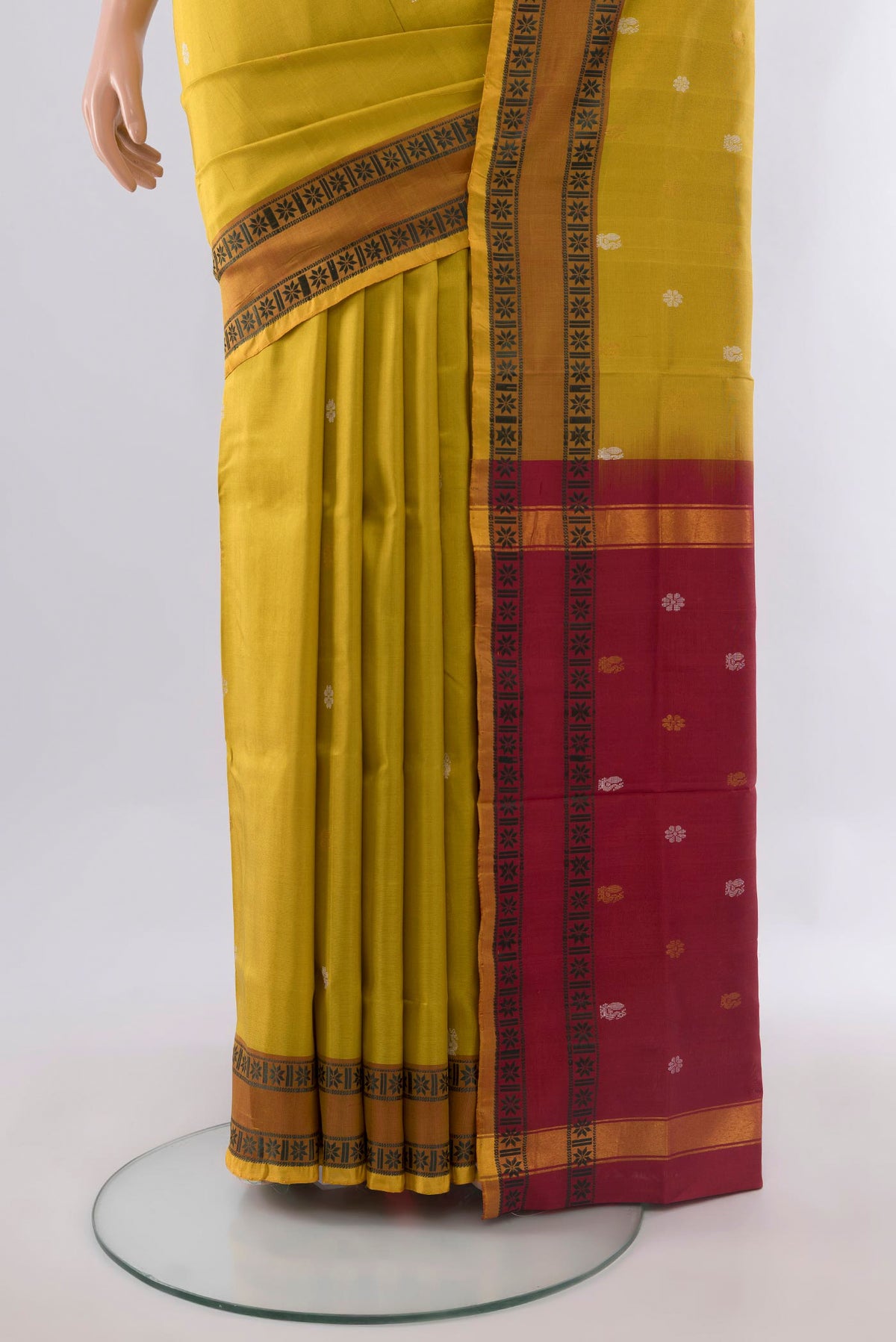 Pleats and pallu of Pure Silk Yellow Uppada Saree with Thread Butta on the body and Thread Border. 
