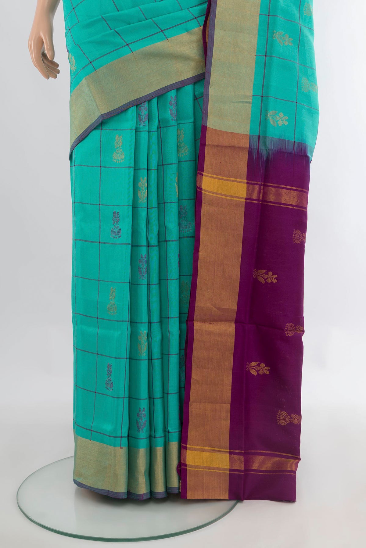 Pleats and pallu of Pure Silk Sea Green Uppada Saree with Zari Butta on the body and Zari Border. 