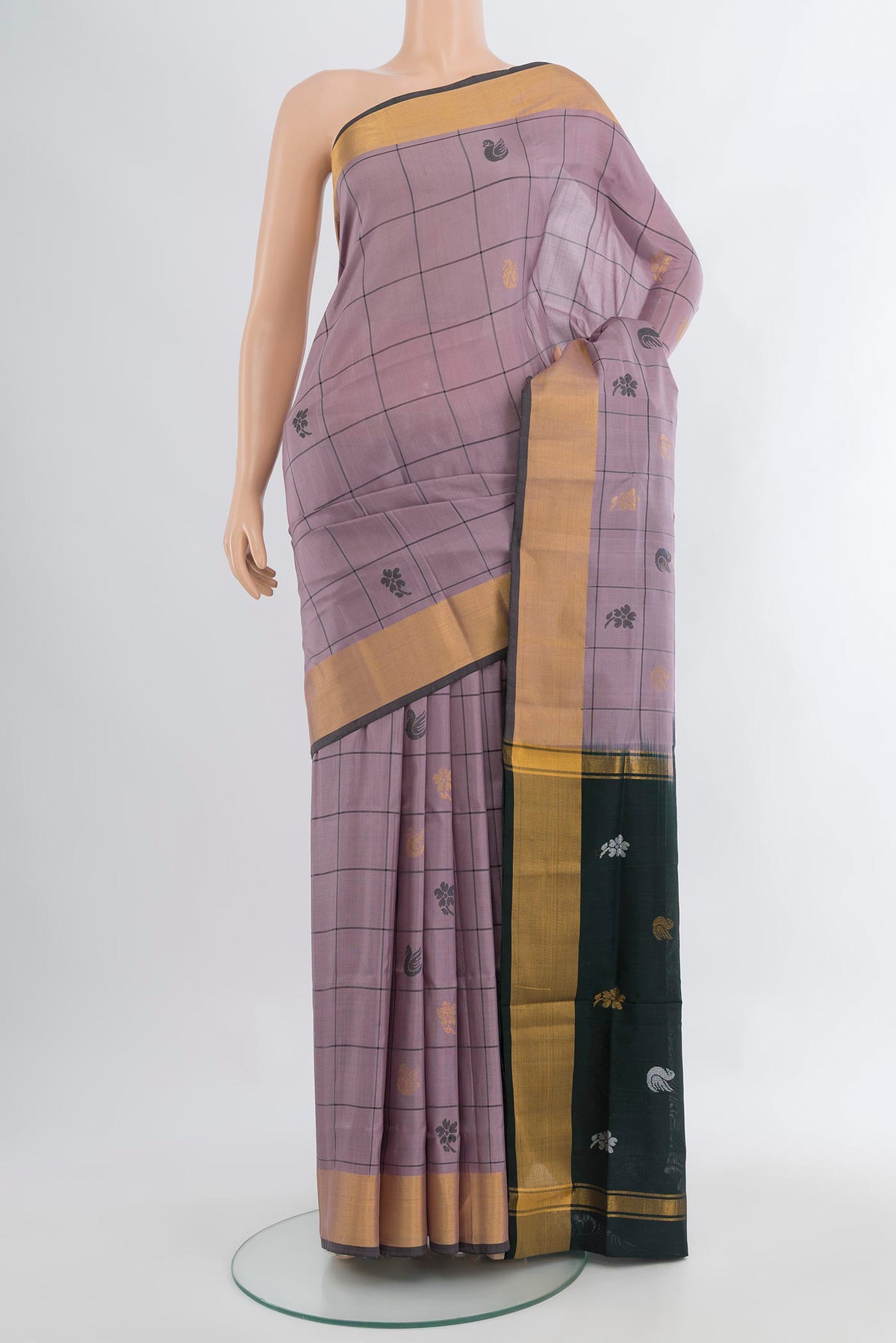 Lavender Uppada Silk Saree with Checked design on the body and Zari Border.  displayed on a mannequin